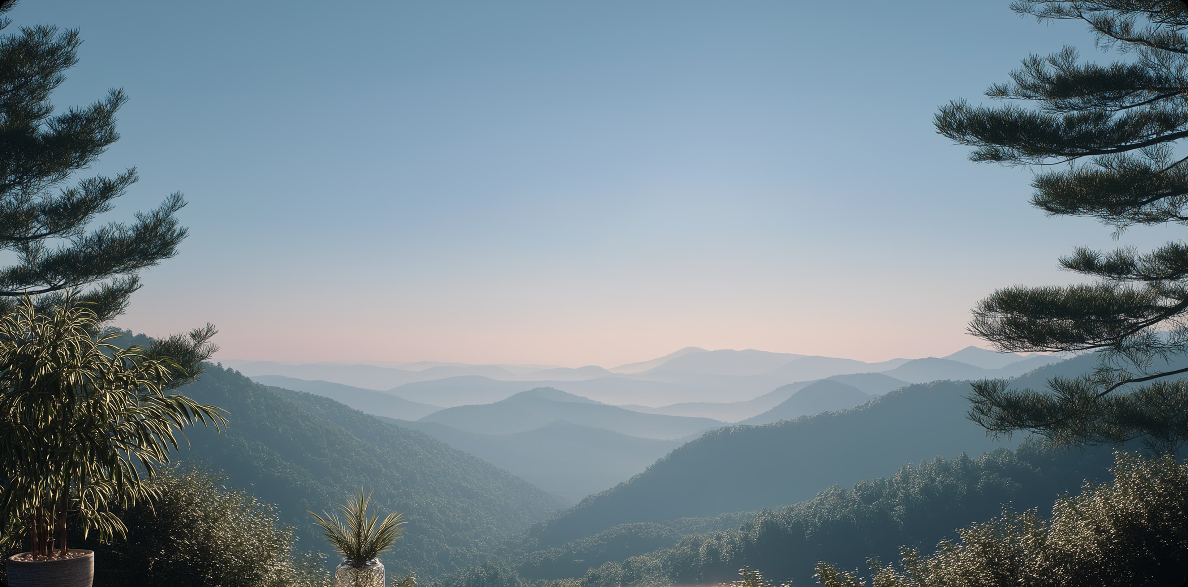 Sunrise over rolling mountain ranges