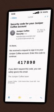 Angled photograph of an email showing the confirmation code 417898.